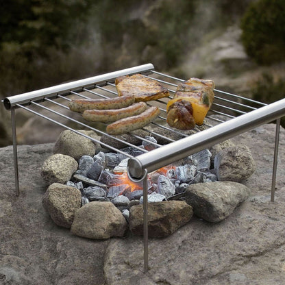 Fuchsia Molly Grilliput portable camping grill with compact design, ideal for outdoor cooking during camping adventures.