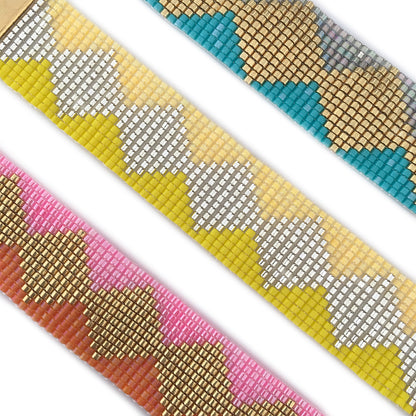 Yellow Athena Soleil bracelets featuring colorful beaded designs on a delicate chain.