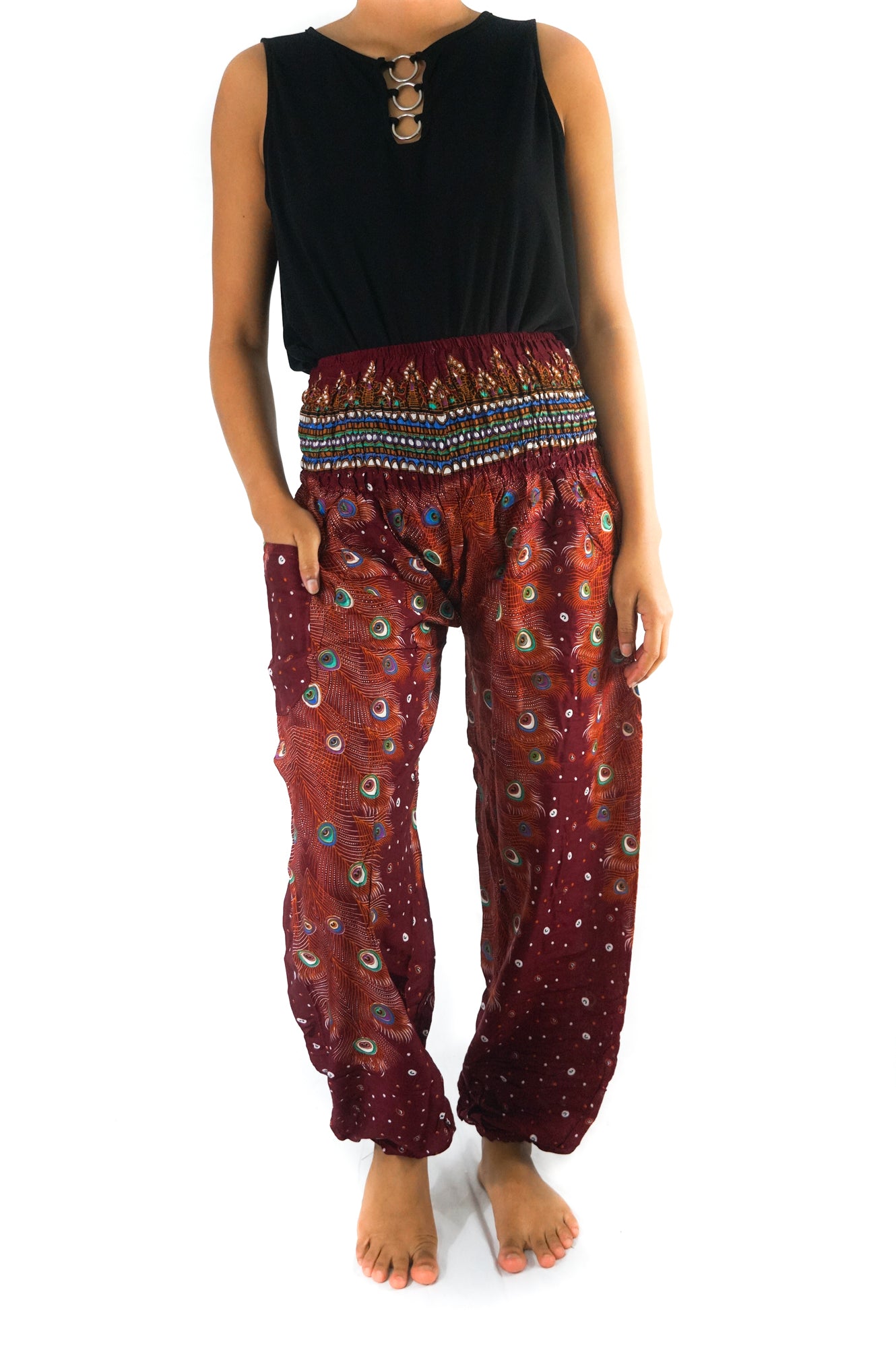 Burgundy peacock print boho yoga pants for women by Tan Smokey, featuring a relaxed fit and hippie style.