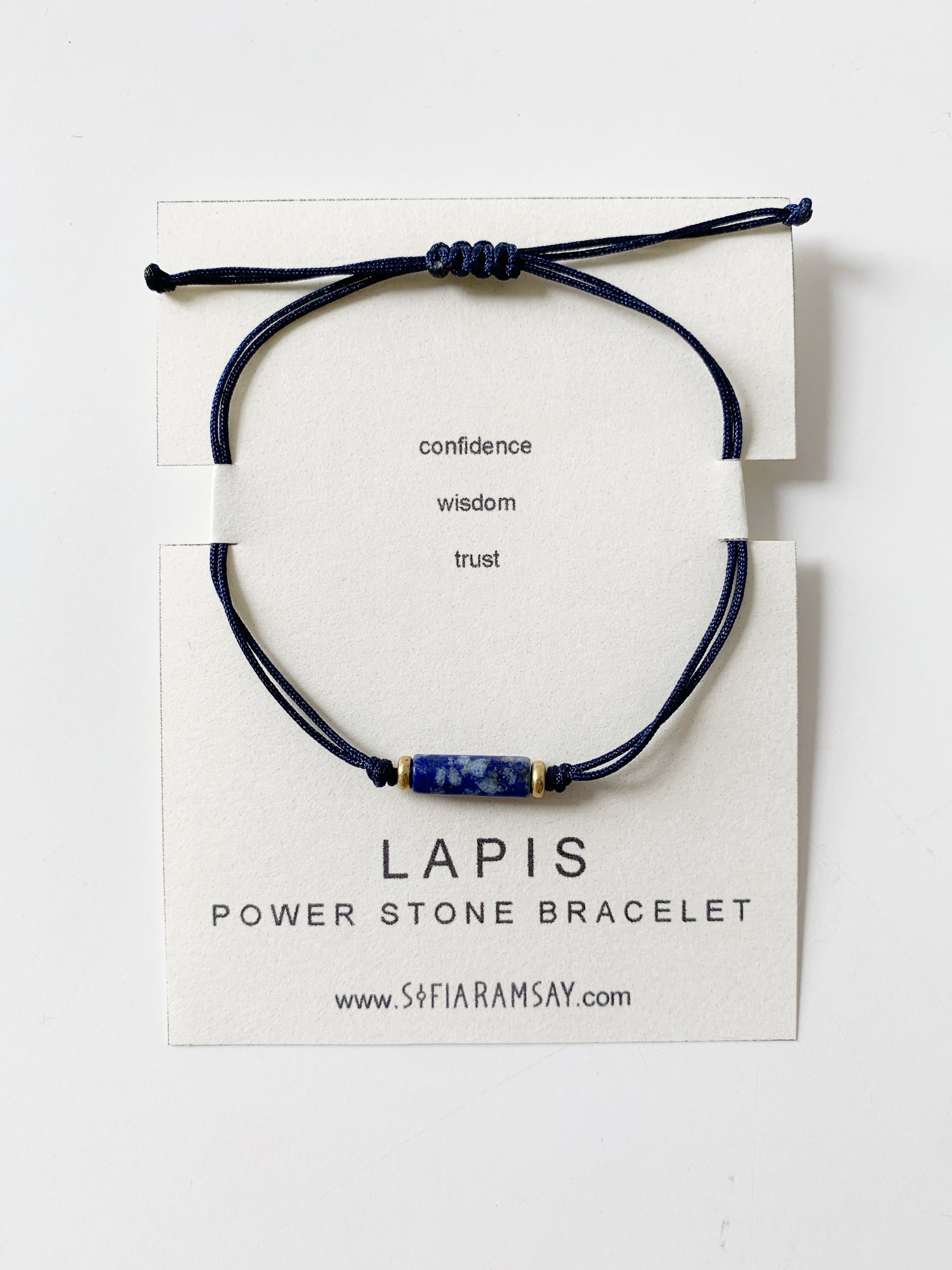 Mint Green Corydalis Lapis Power Stone bracelet with polished blue lapis beads and adjustable cord for jewelry and watch collection.