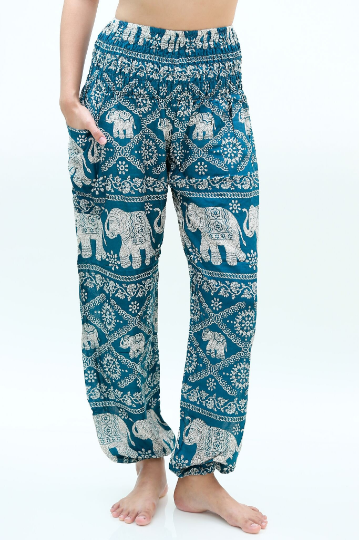 Teal hippie elephant print pants for women, boho yoga pants by Tan Smokey, featuring relaxed fit and vibrant design.