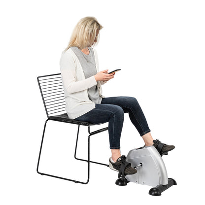 Lilac Milo Home Use Hands and Feet Mini Exercise Bike for indoor fitness, showcasing the compact, adjustable design for exercise.