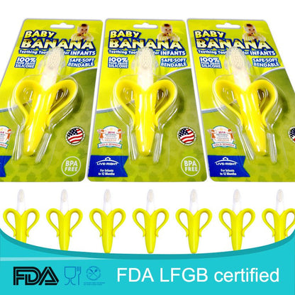 Fuchsia Molly Baby Banana Training Toothbrush as a playful home decor piece with a banana shape and bright pink color.