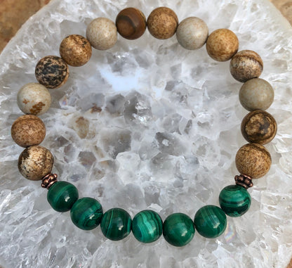 Malachite and picture jasper stretch bracelet featuring genuine stones, crafted by Violet Chaos, displayed on a neutral background.