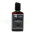 Tan Athena Sawtooth Mountain Cedar Citrus aftershave bottle with citrus and cedar scent, displayed in a sleek, clear bottle.