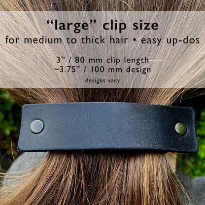 Copper and silver metallic gears on stamped leather hair accessory by Orange Themis, showcasing steampunk-inspired hair decoration.