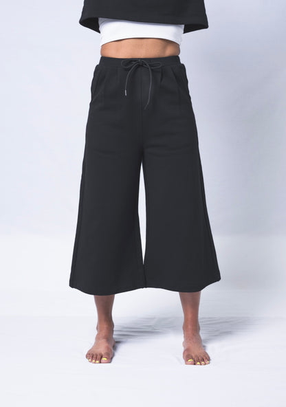 Beige Daisy Colette Pants matching set featuring stylish, comfortable beige pants with a relaxed fit and matching top.