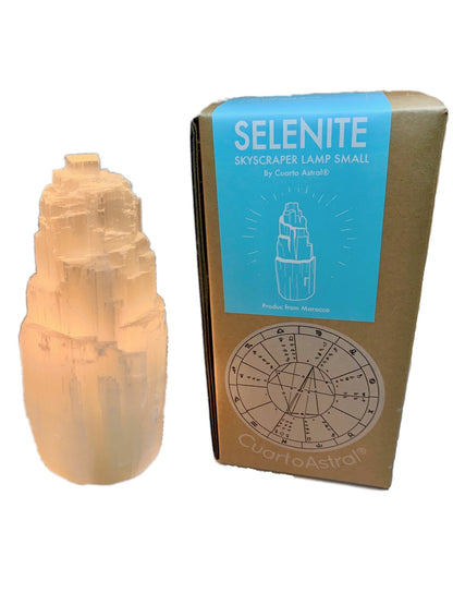 Small Selenite Skyscraper Lamp by Teal Lily, a natural home decor piece with a sleek, luminous crystal design.