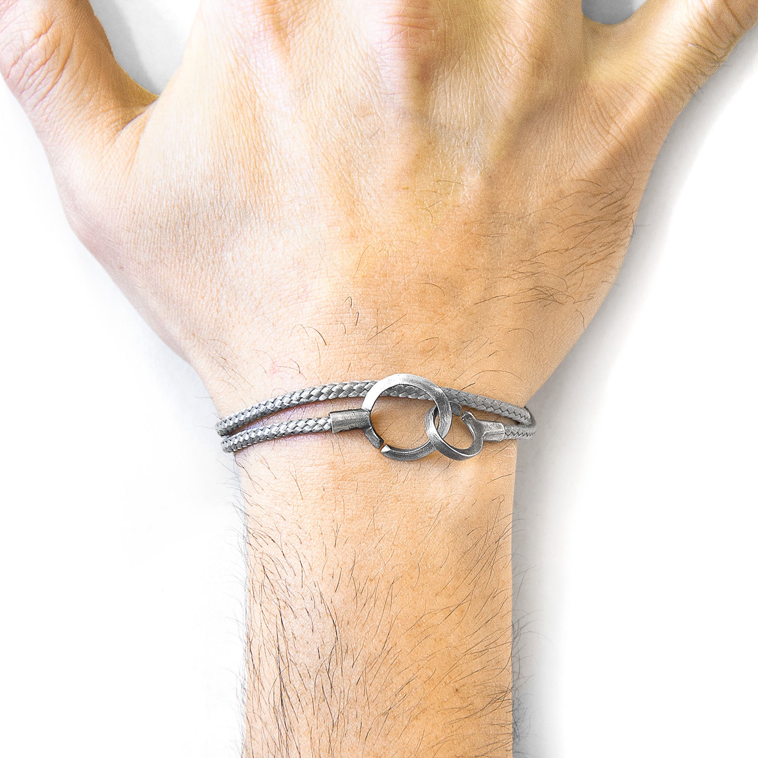 Classic grey Montrose silver and rope bracelet by Magenta Sooty featuring intertwined silver chains and grey rope accents.