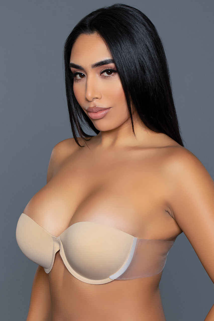 Magenta Caeneus adhesive strapless bra worn on a model, seamless lingerie for backless and strapless outfits.