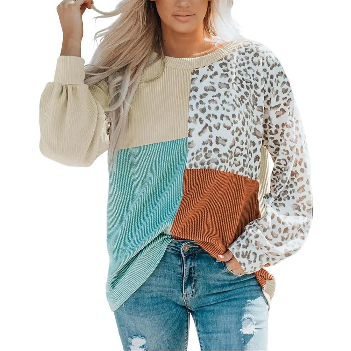 Peach Castor leopard patchwork color block ribbed long sleeve top with mixed animal print and vibrant color blocks.