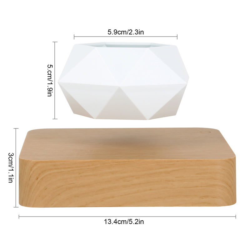 Teal Simba levitating flowerpot with magnetic levitation lighting display, showcasing a modern, floating plant holder with glowing illumination.