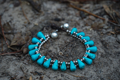 Silver boho bracelets with ocean drop and double strand design by Tan Smokey, featuring intricate silver bead details.