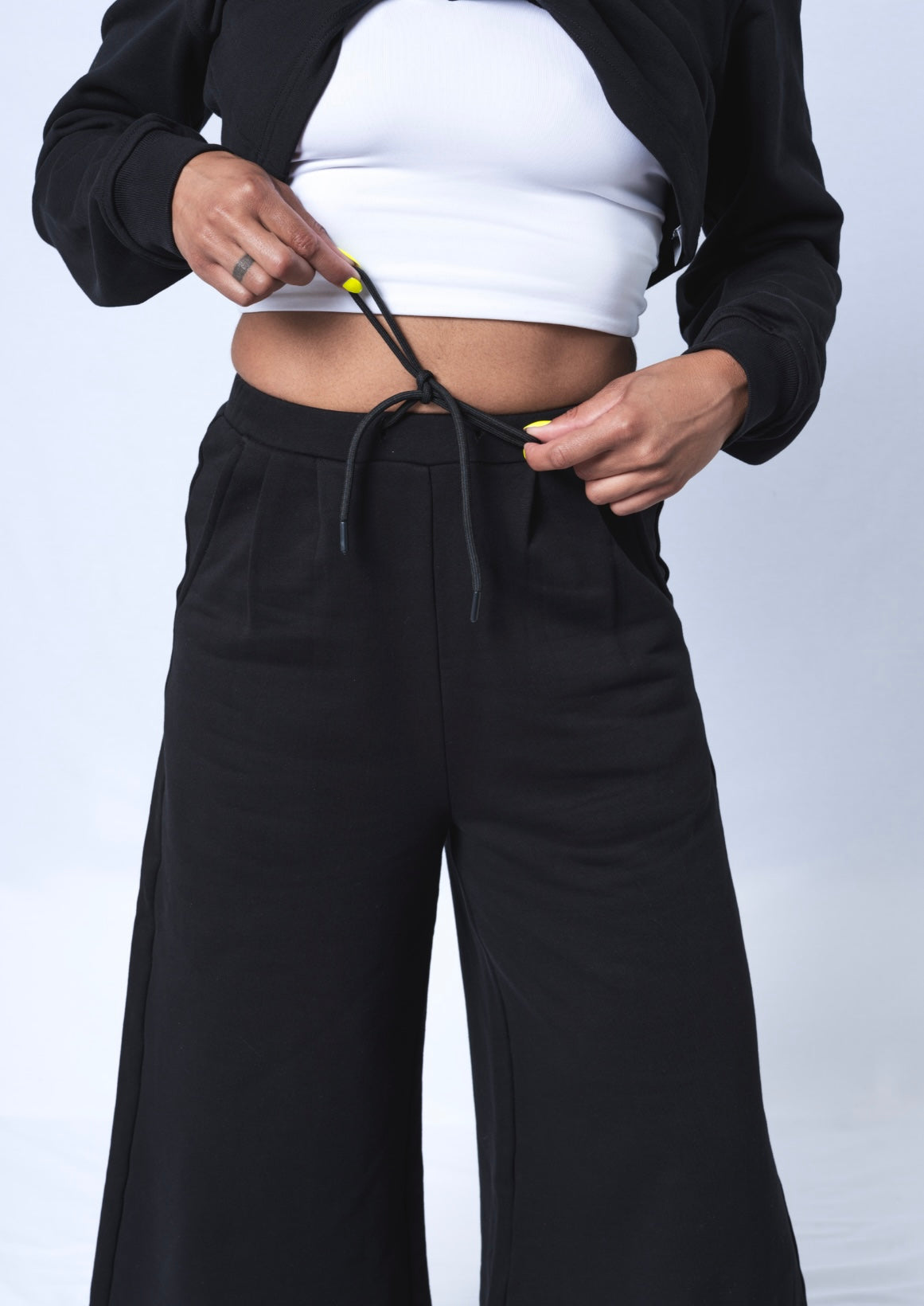 Beige Daisy Colette Pants matching set with high-waisted, relaxed fit pants and coordinating top, made from soft fabric.