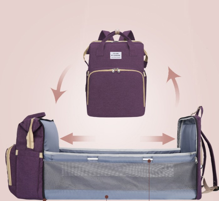Carmine Juneberry ALLFASHION™ FoldAway BabyNest Backpack with adjustable straps and compact foldable design for easy carrying.