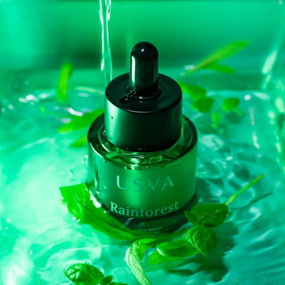 Lilac Lavender Rainforest Omega Rich Oil Serum in a glass dropper bottle, showcasing the skincare product for healthy, radiant skin.