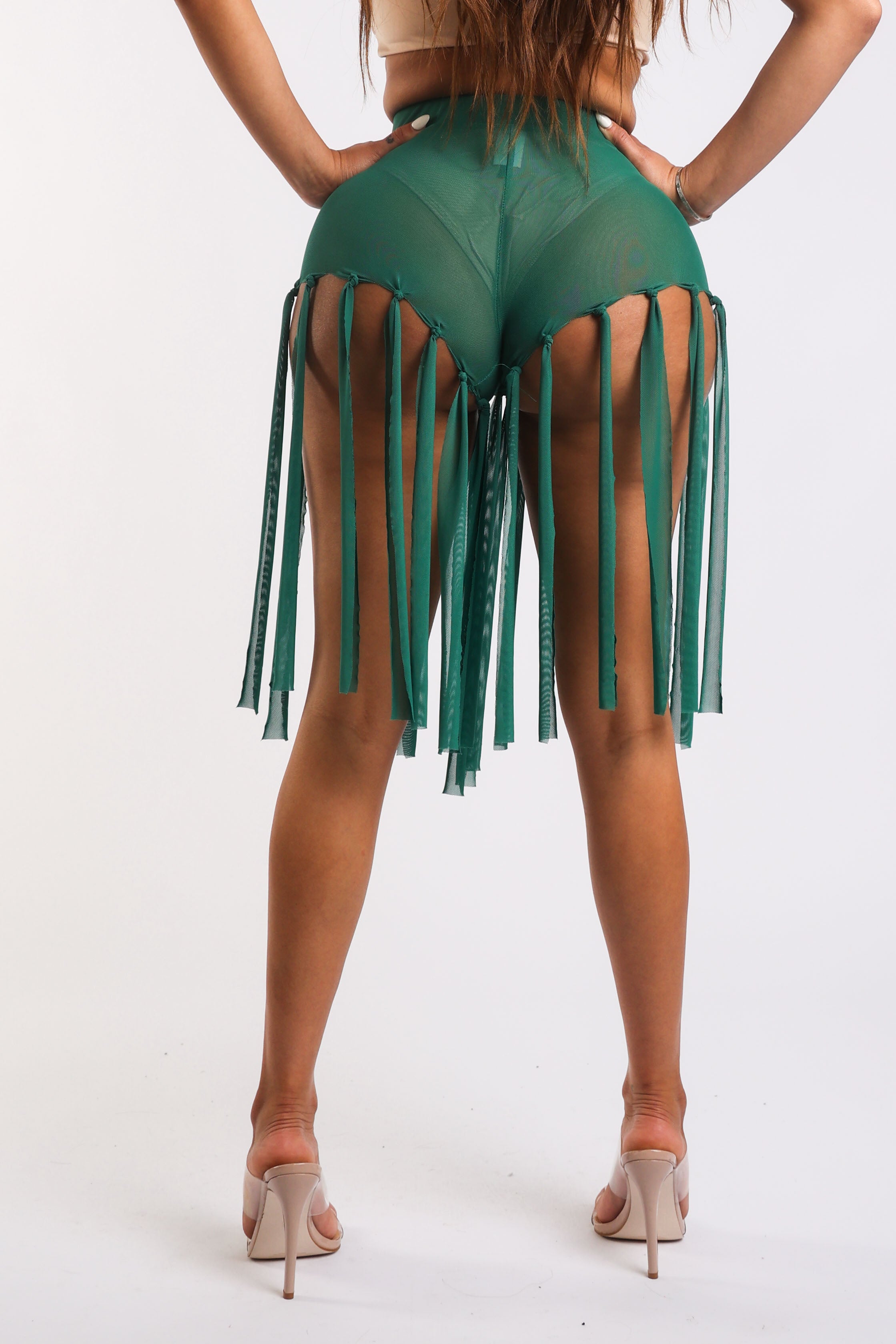 Green fringed mesh shorts by Puce Juniper, stylish and sexy party-ready shorts with eye-catching fringe detail.