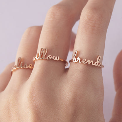 Green Millie stackable mother ring set featuring minimalist gold rings, perfect for stacking and celebrating mom.