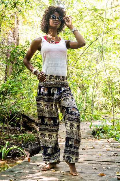 Black boho elephant print pants for women, Tan Smokey hippie yoga pants with a relaxed fit and comfortable style.
