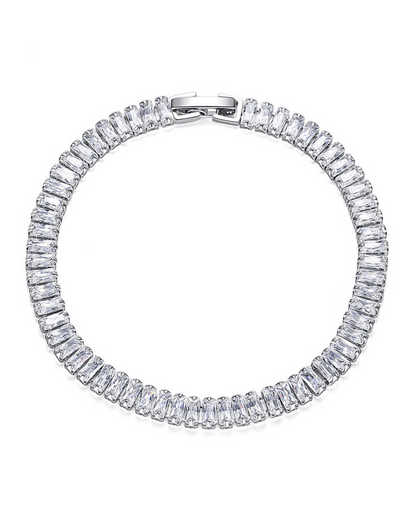 Sterling silver and 18k gold plated Icy Tennis Bracelet by Ultramarine Birch, featuring sparkling icy gemstone accents.