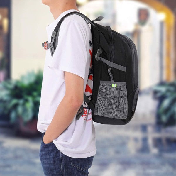 Teal Simba ultralight folding backpack with padded laptop compartment, ideal for sports and outdoor activities, shown in gray with straps.