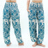 Tan Smokey teal elephant boho pants for women, hippie style yoga pants with colorful elephant print and relaxed fit.