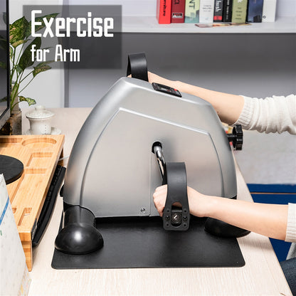 Lilac Milo mini exercise bike for hands and feet, compact sports and outdoors trainer showing foot pedals and adjustable resistance.