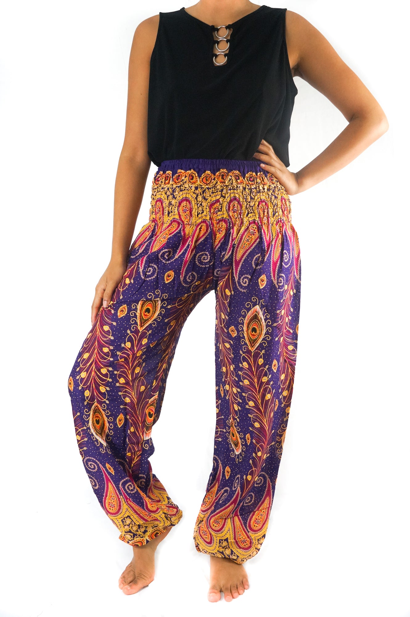 Tan Smokey purple peacock boho gypsy pants with flowing, patterned fabric and wide-leg design, perfect for a bohemian style.