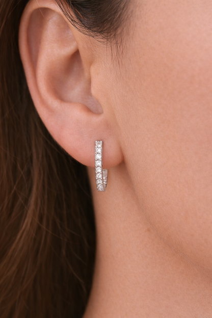 925 Sterling Silver half eternity zircon hoop earrings with 15 mm diameter, featuring sparkling zircon stones and a sleek silver finish.