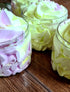 Amethyst Meleager Fruit Salad Shower Fluff whipped soap set with six colorful bath and beauty products, creamy and fruity textures.