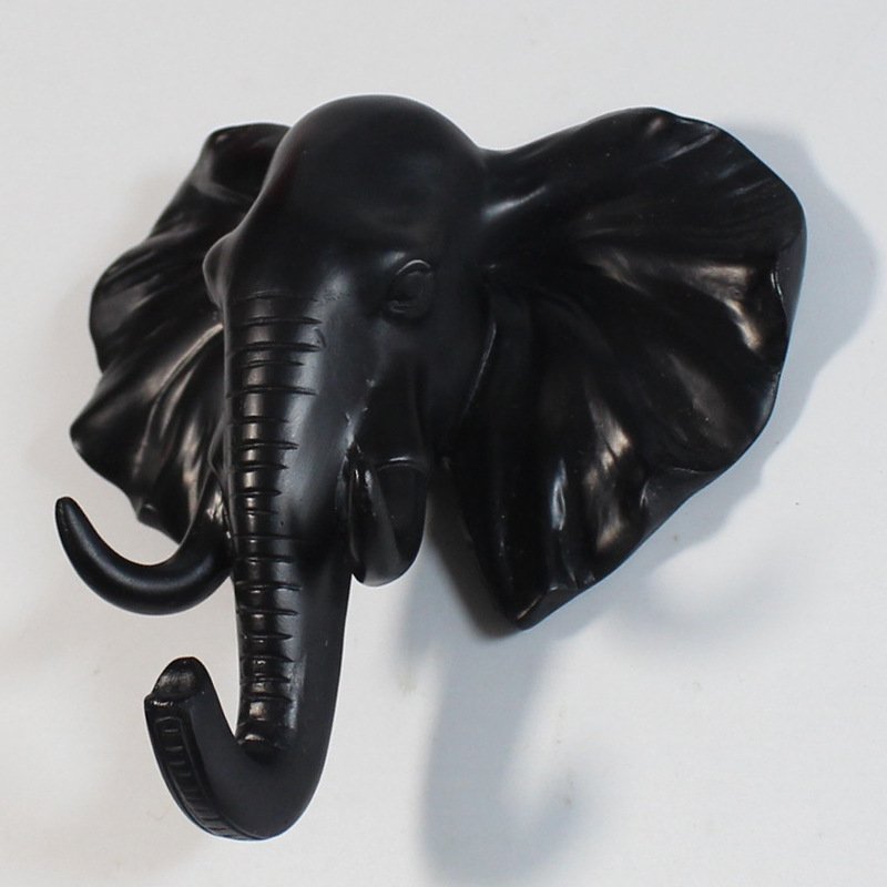 Fuchsia Molly resin elephant head hook for home and garden decor, featuring a detailed elephant design with a sturdy mounting hook.