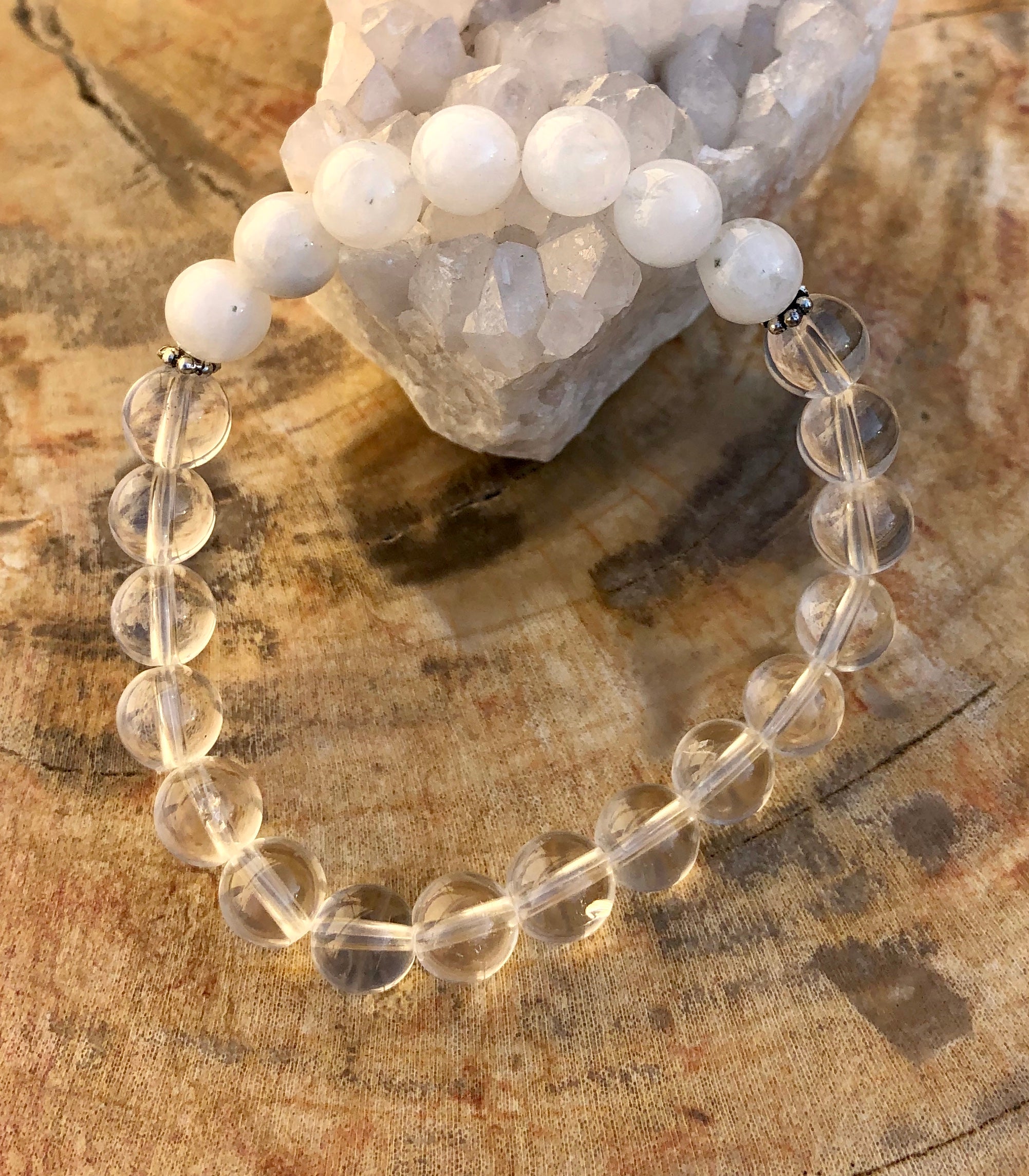 Rainbow Moonstone and Crystal Quartz stretch bracelet with genuine crystals from Violet Chaos, featuring iridescent moonstone and clear quartz beads.