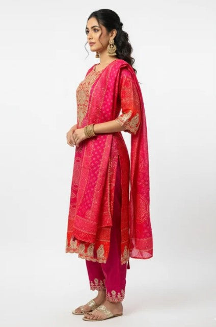 Pink and red Bandhej suit set with matching dupatta for women by Viridian Caeneus, featuring traditional Indian fabric and intricate patterns.