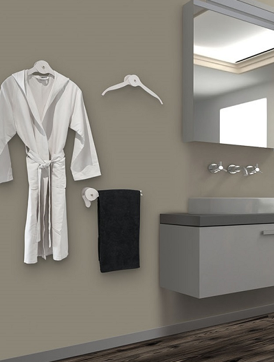 Orange Millie ash wood trouser hangers wall decor with sleek design, perfect for organizing and decorating your closet space.