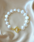 Baroque genuine freshwater pearl and 925 sterling silver bracelet by Ultramarine Birch, featuring elegant pearls and silver accents.
