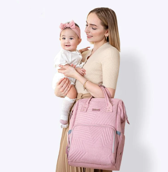 Maroon Chronos modern quilted diaper bag backpack for kids and babies with multiple compartments and padded straps.