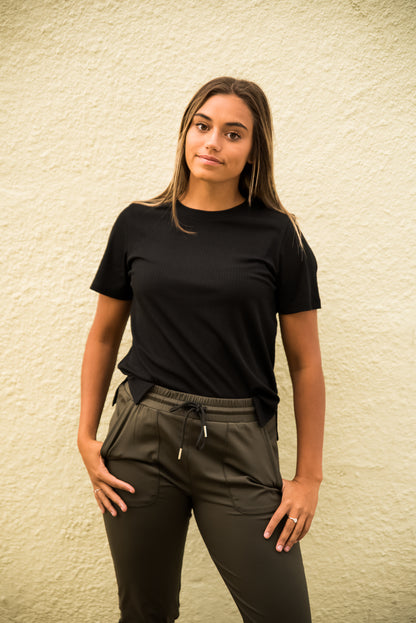 Black DT Alyssa Rib Knit Split Hem Tee by Lavender Danae, a stylish ribbed knit top with a split hem and relaxed fit.