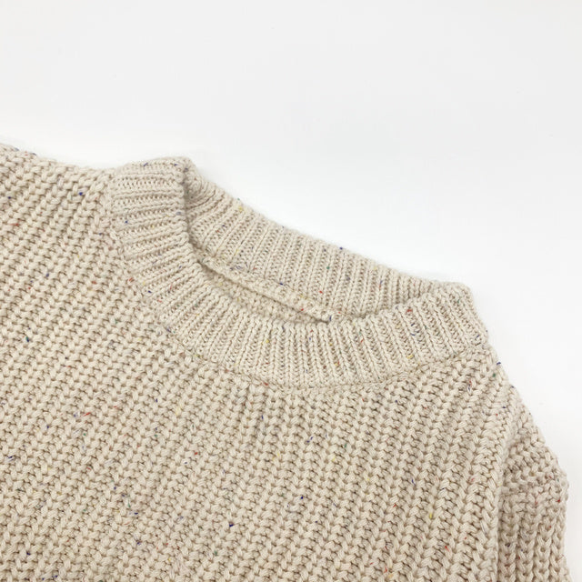 Carmine Juneberry SnuggleThread™ cotton knit baby sweater in soft pastel, featuring long sleeves and cozy design for infants.