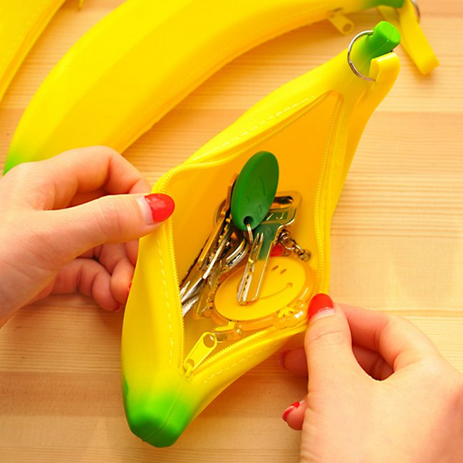 Fuchsia Molly banana design wallet with a vibrant yellow banana print, compact and stylish for everyday use.