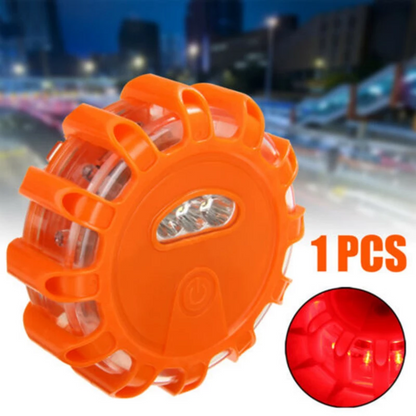 Teal Simba roadside safety LED light with flashing red and orange emergency signals for automotive roadside safety.