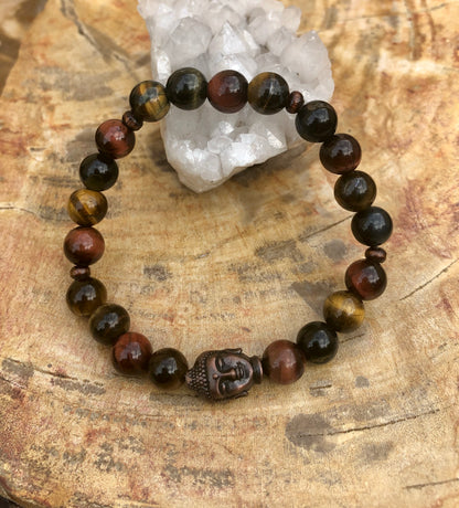 Violet Chaos multi tiger eye and Buddha gemstone stretch bracelet with polished beads and spiritual charm details.