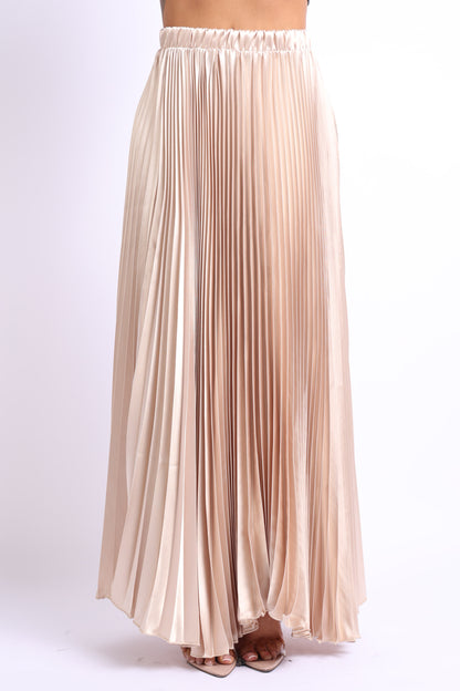 Pucci Juniper taupe elastic high waist A-line pleated satin maxi skirt displayed on a model.