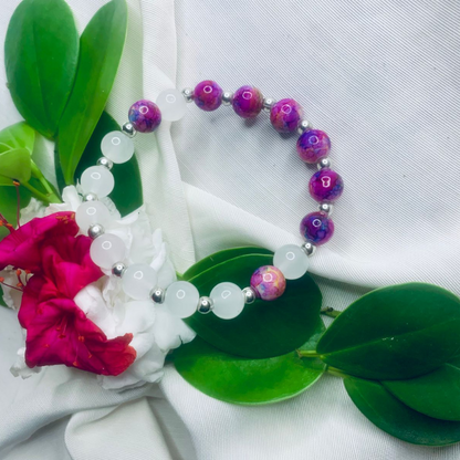 White and purple stone stretch bracelet with silver spacers by Tan Saffron, featuring polished beads and elegant design.