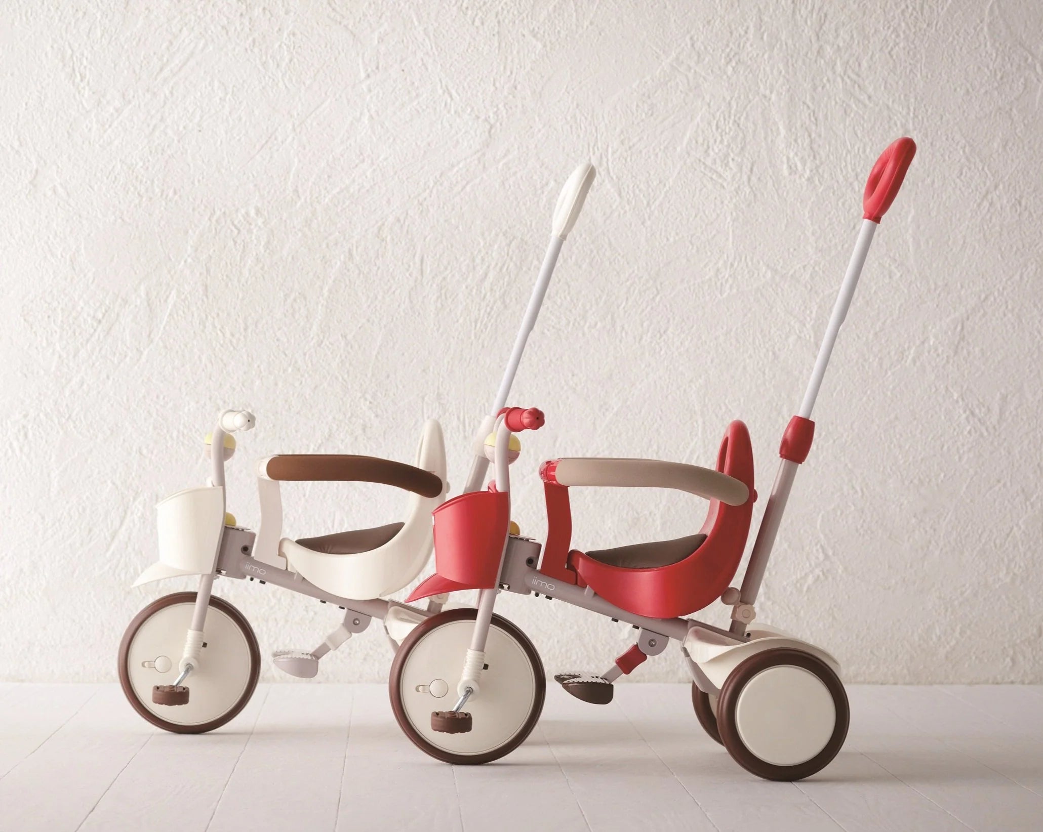 Taupe Pear Evolutive Tricycle for biking, featuring a sturdy frame, comfortable seat, and three-wheel design for stability.