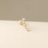 Blue Chrysippus 14K solid gold Xavia earrings featuring elegant hoop design with a polished finish and secure clasp.