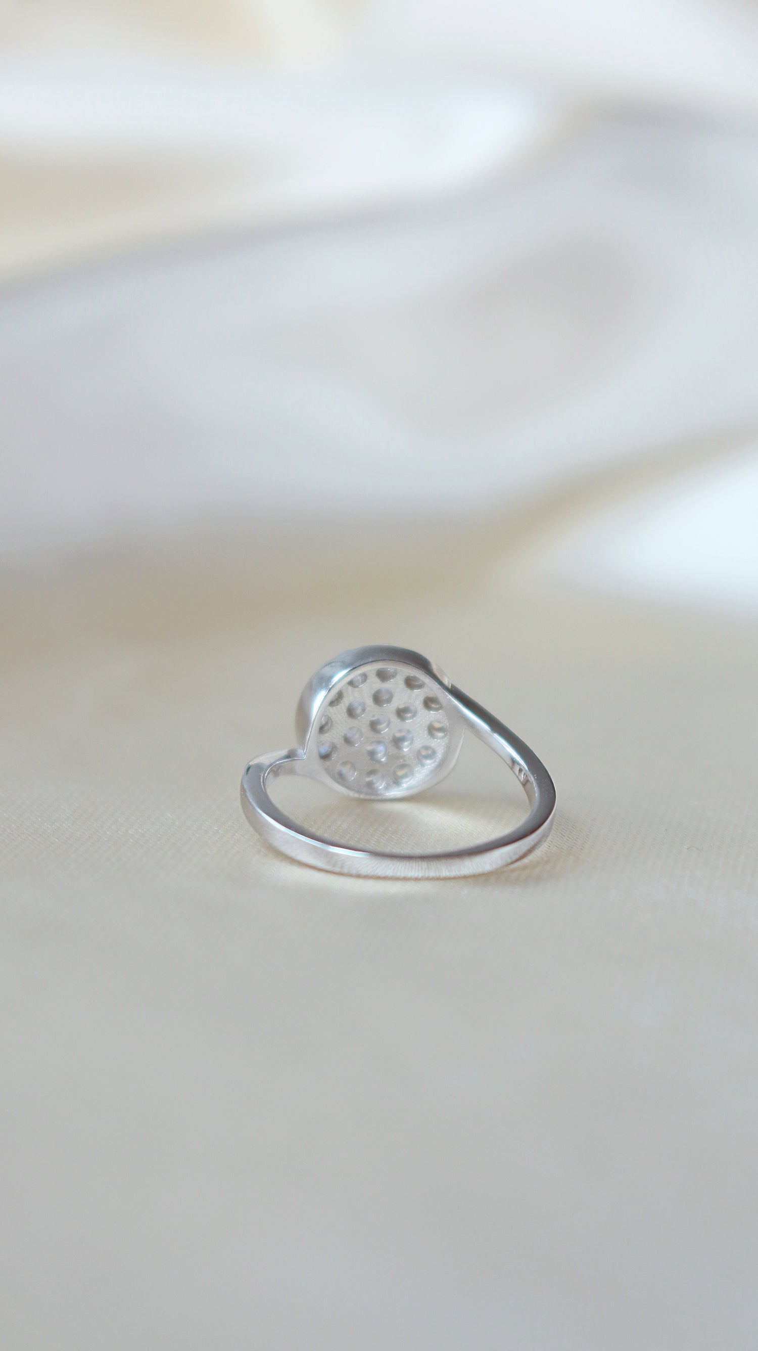 925 silver statement ring with diamond button design by Ultramarine Birch, showcasing a bold, modern jewelry piece.