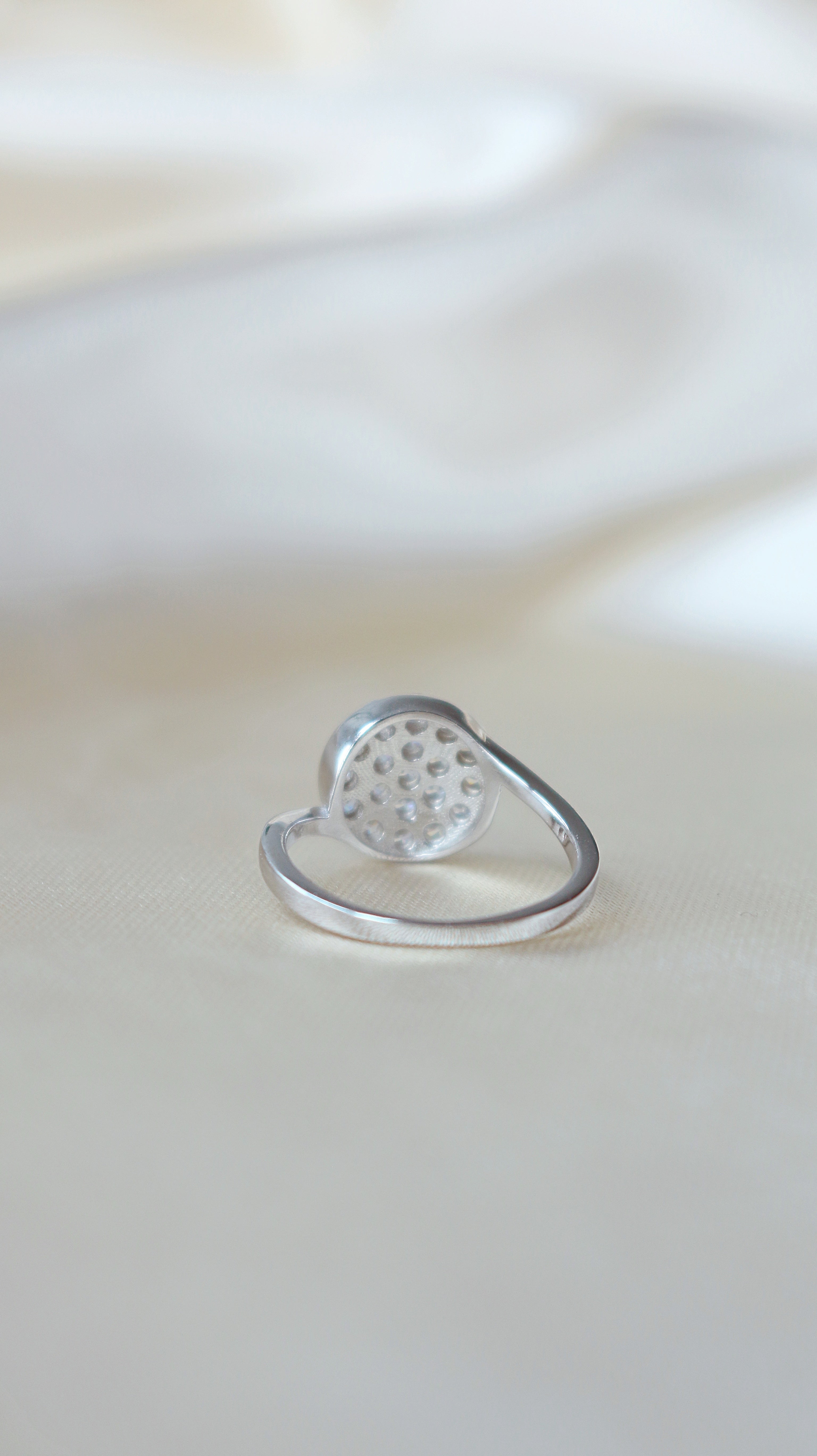 925 silver statement ring with diamond button design by Ultramarine Birch, showcasing a bold, modern jewelry piece.