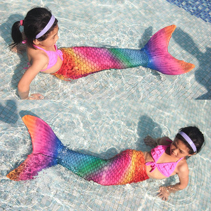Fuchsia Molly mermaid swimsuit towel with vibrant mermaid scale design, soft fabric, perfect for beach or poolside relaxation.