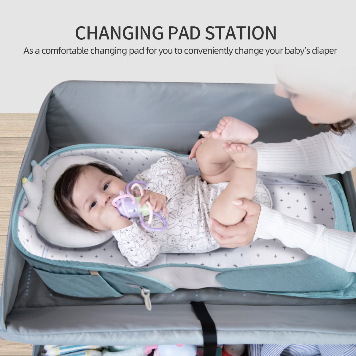 Maroon Chronos portable diaper bag backpack for kids and babies, featuring multiple compartments and adjustable straps.