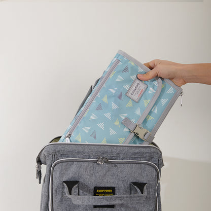 Maroon Chronos folding travel changing pad for kids and babies, compact and portable for on-the-go diaper changes.